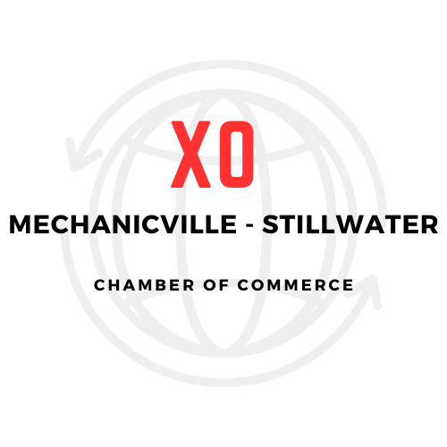 Red letters X and O sit slightly above center of a white background. Black text centered below reads "Mechanicville - Stillwater Chamber of Commerce"